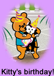 Clara taking picture of
                                            Kitty with Clarence Bear